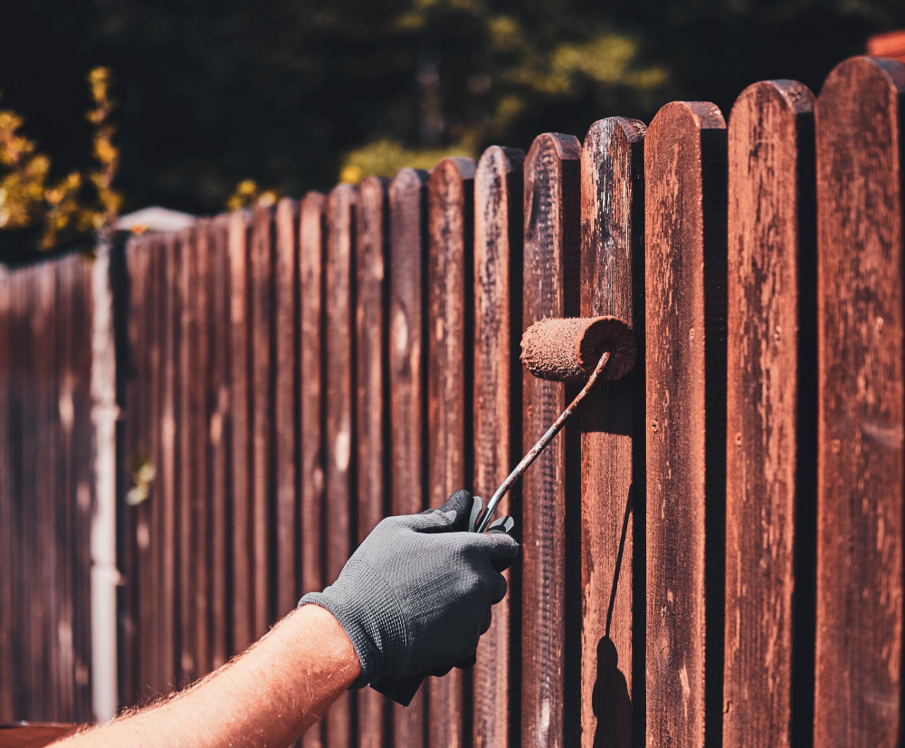 man-protective-gloves-is-painting-wooden-fence-bright-summer-day (1) man-protective-gloves-is-painting-wooden-fence-bright-summer-day (1)